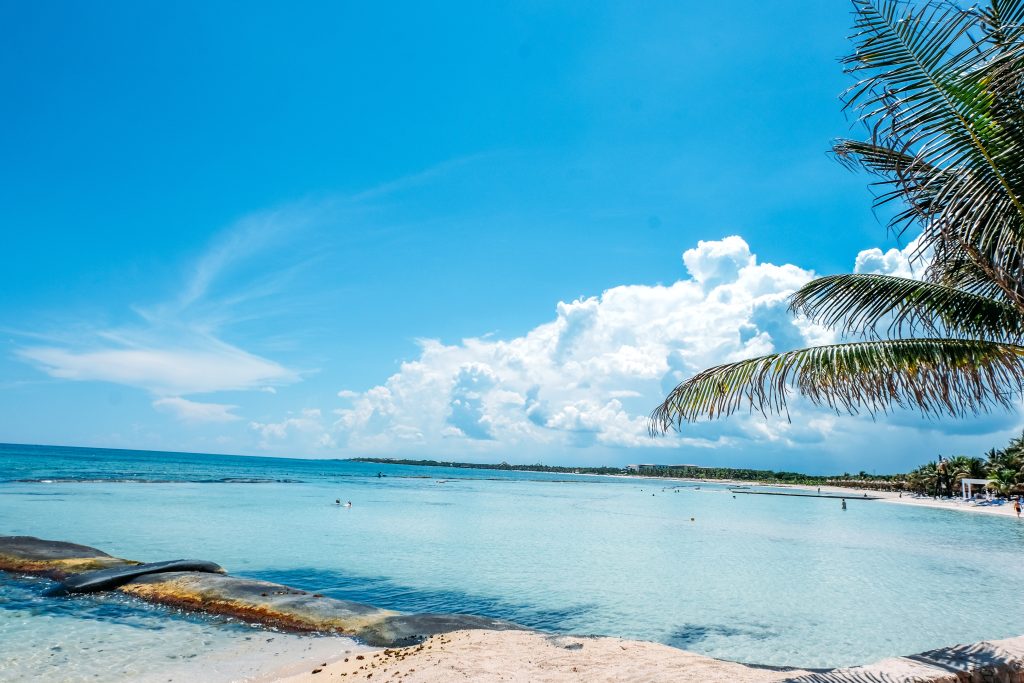 beach with crystal blue water and blue sky 2024 10 18 03 18 55 utc